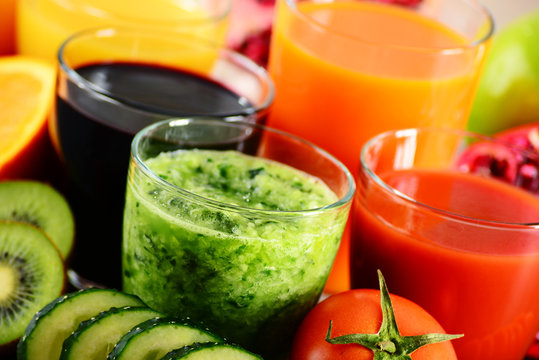 Glasses of fresh organic vegetable and fruit juices