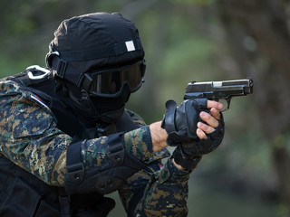 Fototapeta premium Police spetial forces,filtered and under exposed photo,national flag on policeman arms and chest