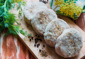 Raw cutlets made of chickent, close-up, selective focus