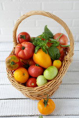 fresh tomatoes in large basket