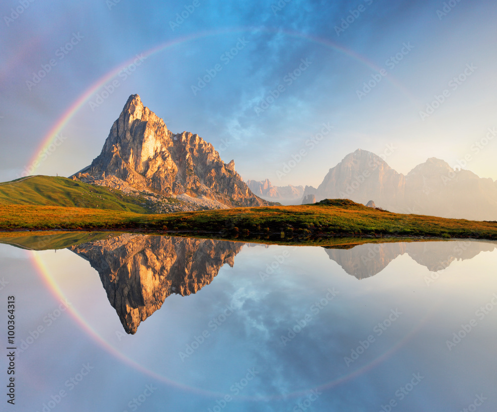 Canvas Prints Rainbow over Mountain lake reflection, Dolomites, Passo Giau