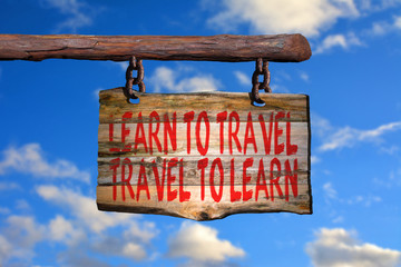 ... motivational phrase sign on old wood with blurred background