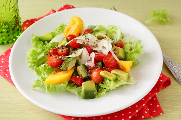 fresh salad with avocado and vegetables