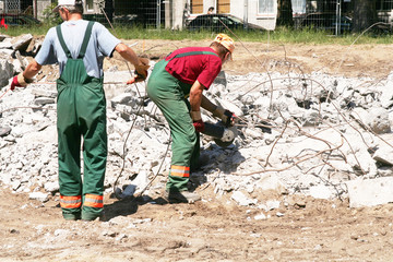 Demolition of the building by two men