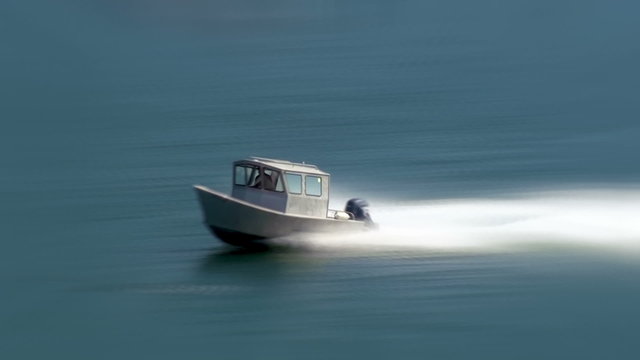 Shot following a boat cruising through the water near Ketchikan, AK.