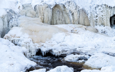 Fototapeta na wymiar frozen waterfall Keila-Joa, Estonia at cold winter
