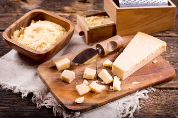 parmesan cheese on wooden board
