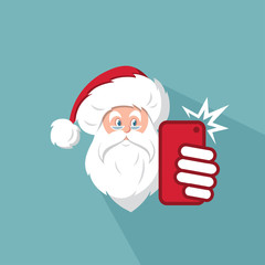 Santa Claus taking photo of himself by his phone