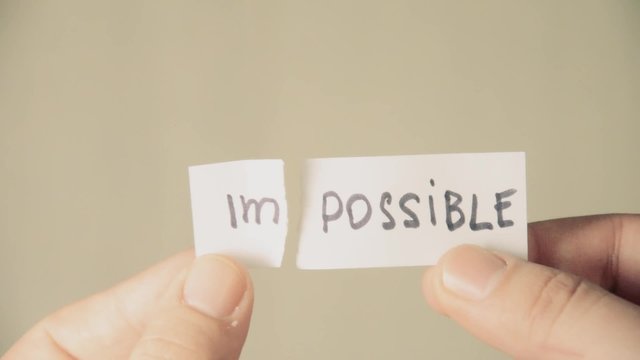 impossible turns to possible. Changing the word impossible to possible. Man makes the impossible possible
