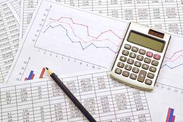 Photo the calculator  with financial the numbers  and graph