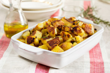 Roasted fried potatoes with garlic, rosemary