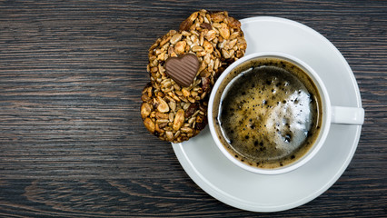 Coffee cup on wooden table.