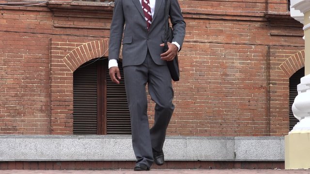 Business Man Walking to Camera