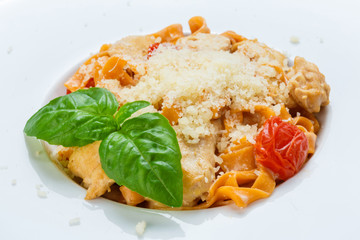 Traditional italian pasta with cured tomato