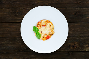 Traditional italian pasta with cured tomato
