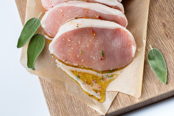 raw pork escalope with sause made of honey and herbs