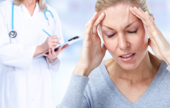 Woman Having A Migraine Headache.