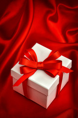 White gift box red ribbon bow. Valentines Day