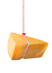 A piece of cheese wrapped in measuring tape