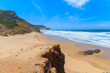 A view of sandy Castelejo beach, famous place for surfing, Algarve region, Portugal
