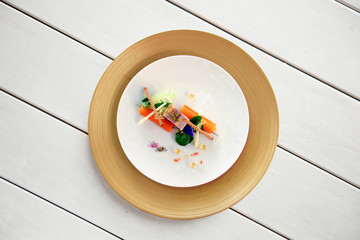 Colorful dish on white table