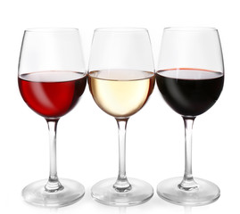 Different kinds of wine in gasses on light background