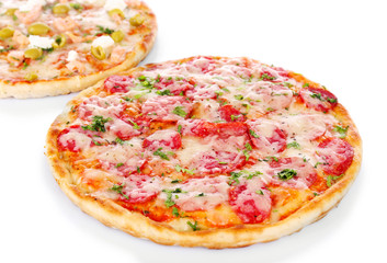 Two delicious tasty pizzas, closeup