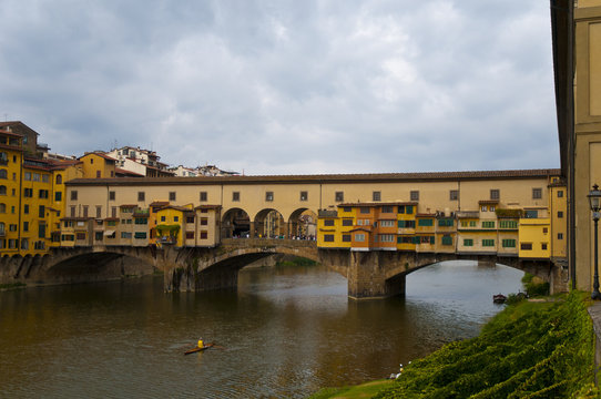 View of The Ponte Vecchio "Old Bridge" a Medieval stone closed-spandrel segmental arch bridge in Firenze ,italy
