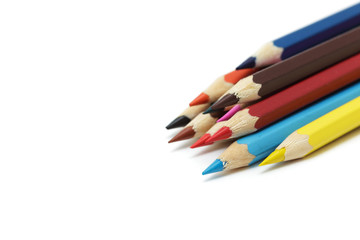 sharp sharpened colored pencils on a white background - statione