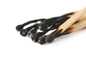 Pile of burnt match sticks isolated