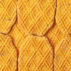 Surface covered with cheese cookies