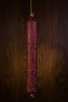 salami  on a wooden background