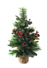 Small artificial Christmas tree isolated