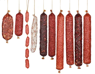 Fotobehang selection salami sausages isolated on white background © Igor Dudchak