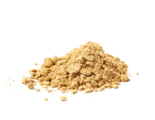 Pile of dry ginger powder isolated