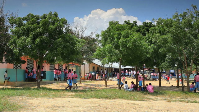 Normal traffic outside a school in a Kenyan village.