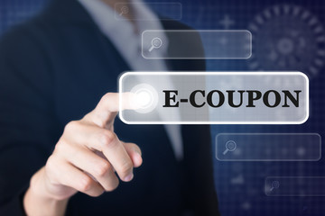 Businessman pressing a E-COUPON concept button. Can be used in advertising.