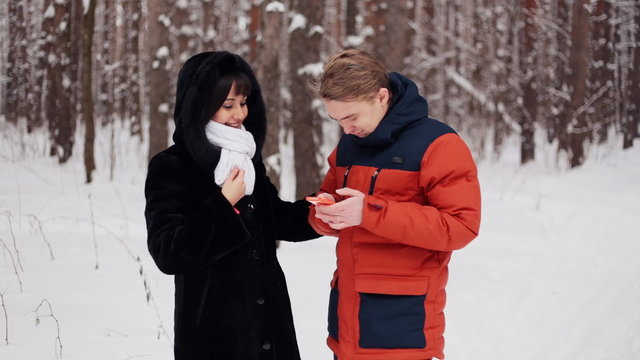 Happy couple taking selfie in slowmotion