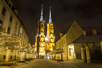 Night photo of illuminated St. John the Baptist Cathedral in Wroclaw, Poland