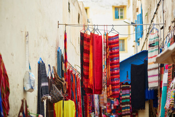 Fototapeta na wymiar Colorful fabrics and carpets for sale in Morocco
