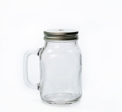 Empty jar with cap on white background