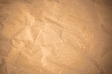 Brown crumpled recycle paper background.