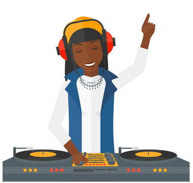 Smiling DJ with console.