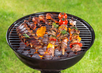 Barbecue grill with various kinds of meat.