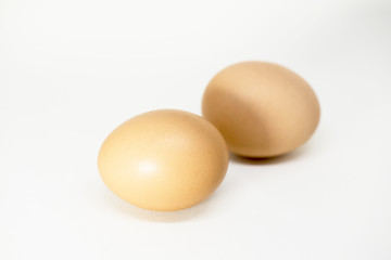Organics chicken eggs on white backgound 
