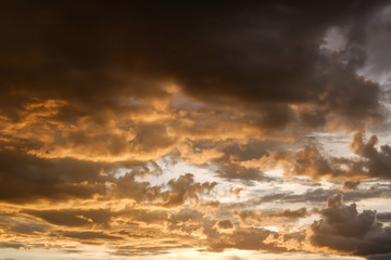 Naklejka na ściany i meble sunset sky and glowing cloud, twilight sky before rain weather