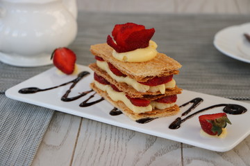 Strawberries Mille Feuille Cake in white plate