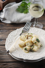 Italian traditional codfish with onion and parsley