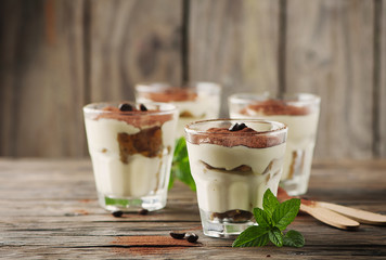 Traditional italian cake tiramisu with cookie and coffee