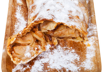 stuffing of the cut apple strudel on board